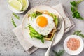 Savory waffles with avocado, arugula and fried egg for breakfast Royalty Free Stock Photo