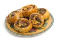 Savoury Pinwheels over white background