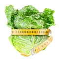 Savoy cabbage with measure tape around. Diet and weight loss concept. 3D rendering