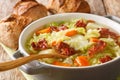 Savoy cabbage soup with potatoes and bacon close-up in a bowl. Horizontal Royalty Free Stock Photo
