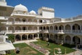 View of the courtyard plaza and arch walkway at the Anuraga Palace, Luxury Resort and Spa