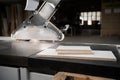 Sawing fiberboard at furniture factory workshop. Production, manufacture and woodworking industry concept Royalty Free Stock Photo