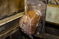 Sawing a meteorite on a machine using a diamond wire with water supply