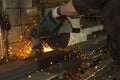 Sawing steel. Circular saw and sparks. Production details. Metal cutting