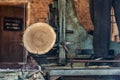 Sawmill cutting log process of making wood planks lumber and timber industry Royalty Free Stock Photo