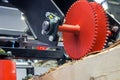 Sawmill feeding flanges in woodworking machine Royalty Free Stock Photo