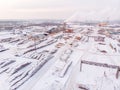 Sawmill, Log storage timber, winter harvesting of wood. Russia, Tomsk