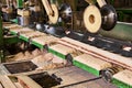 sawmill machinery inside a modern lumber mill