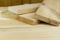 Sawn boards lie on the wooden surface.Construction materials from pine Royalty Free Stock Photo