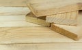 Sawn boards lie on the wooden surface.Construction materials from pine Royalty Free Stock Photo