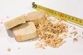 Sawn-off boards (of wood) among the sawdust