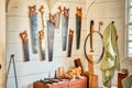Saws hanging in a workshop. Royalty Free Stock Photo