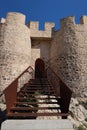 Access stairs to the entrance door of the Almohad castle of Sax on top of a rock. Sax, Alicante, Spain