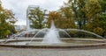 The Saxon Garden with fountain in Warsaw. Water spraying from fountain. fountain sparkling in the city Park Royalty Free Stock Photo