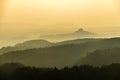 Saxon Switzerland mountains landscape layers in fog, Germany