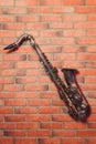 Saxophone classical music instrument Saxophonist with alto sax closeup. Royalty Free Stock Photo