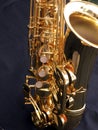 Saxophone detail on black background Royalty Free Stock Photo