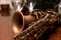 Saxophone an glasses on a bar Royalty Free Stock Photo