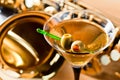 Saxophone and martini with green olives