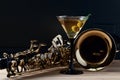Saxophone and martini with green olives