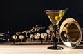 Saxophone and martini with green olives
