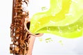 Copper saxophone with notes with yellow background