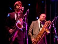 Saxophone players of The Limboos (rhythm and blues band) performs at Apolo venue