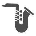 Saxophone solid icon. Jazz trumpet vector illustration isolated on white. Musical wind instrument glyph style design Royalty Free Stock Photo