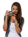 Say cheese. Cropped portrait of a young photographer holding a camera while against a white background.