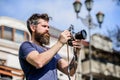 Say cheese. retro photographic equipment. photo of nature. reporter or journalist. Mature hipster with beard. Bearded Royalty Free Stock Photo