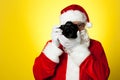 Say cheese! Santa capturing a perfect moment Royalty Free Stock Photo