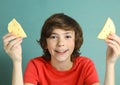Say cheese smile preteen boy with two cheese slices Royalty Free Stock Photo
