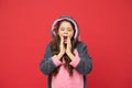 Say good night. Yawny child red background. Little girl yawn in pajamas. Bedtime. Bed time. Lounge time. Good evening or Royalty Free Stock Photo