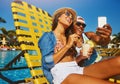 Say, I love summer. an affectionate young couple taking selfies while enjoying a few drinks poolside. Royalty Free Stock Photo