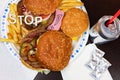 Say No To Junk Food. Juicy burger and fries with anti fast food slogan on it. Anti fast food, time for diet concept Royalty Free Stock Photo