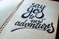 Say Yes to New Adventures calligraphic background