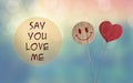 Say you love me with heart and smile emoji Royalty Free Stock Photo