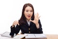 Saying young asian student on the desk. Royalty Free Stock Photo