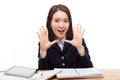 Saying young asian student on the desk. Royalty Free Stock Photo