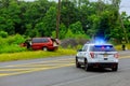 Sayreville NJ USA - Jujy 02, 2018: Police flashing blue lights at accident damaged car Royalty Free Stock Photo