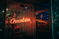 Sayville Chocolatier neon sign at night, Sayville, New York