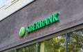 Sberbank green logo on building. Bank sign