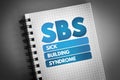 SBS - Sick Building Syndrome acronym on notepad, medical concept background