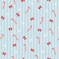 Light blue stripes seamless Christmas background, Bowknot and candy cane elements Royalty Free Stock Photo