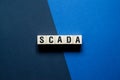 Scada word concept on cubes Royalty Free Stock Photo