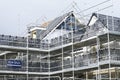 Scaffold at construction of new houses in residential building site Royalty Free Stock Photo