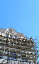 Scaffolding around a building renovating facade Royalty Free Stock Photo