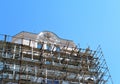 Scaffolding around a building renovating facade Royalty Free Stock Photo