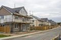 Scaffolding around houses in a new housing development Royalty Free Stock Photo