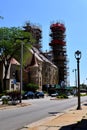 Scaffolding around tall church spires at entrance